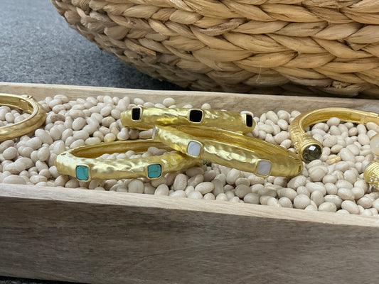 Three stone hinge bangle